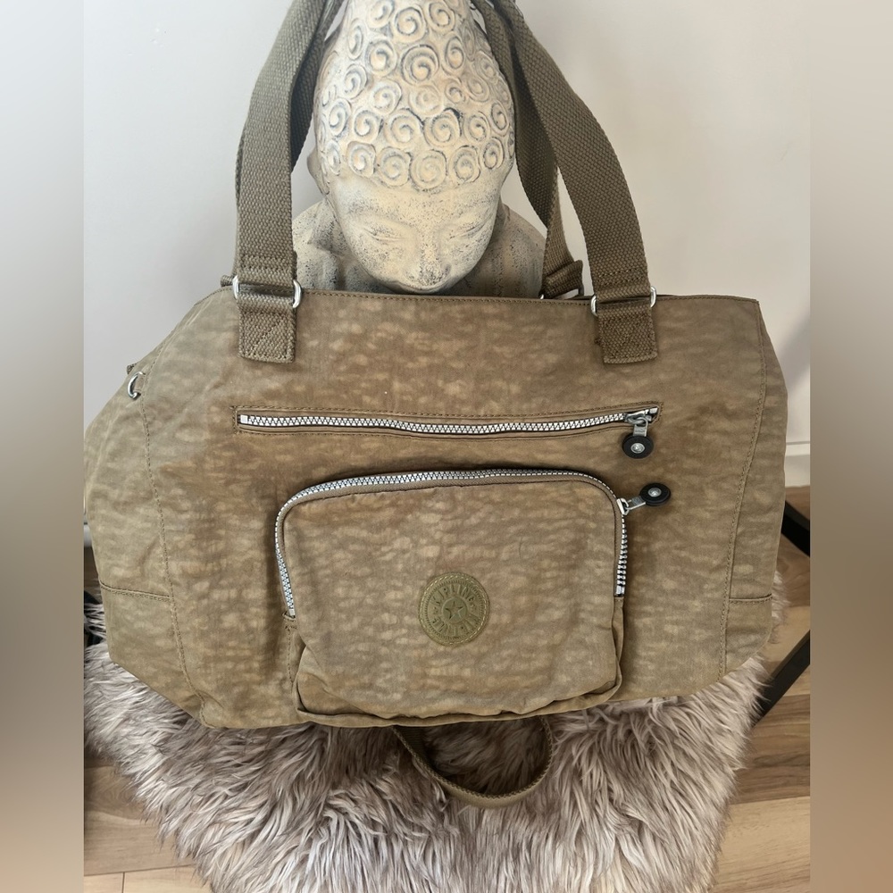Khaki Kipling medium tote loaded with pockets. Excellent condition. Barely used